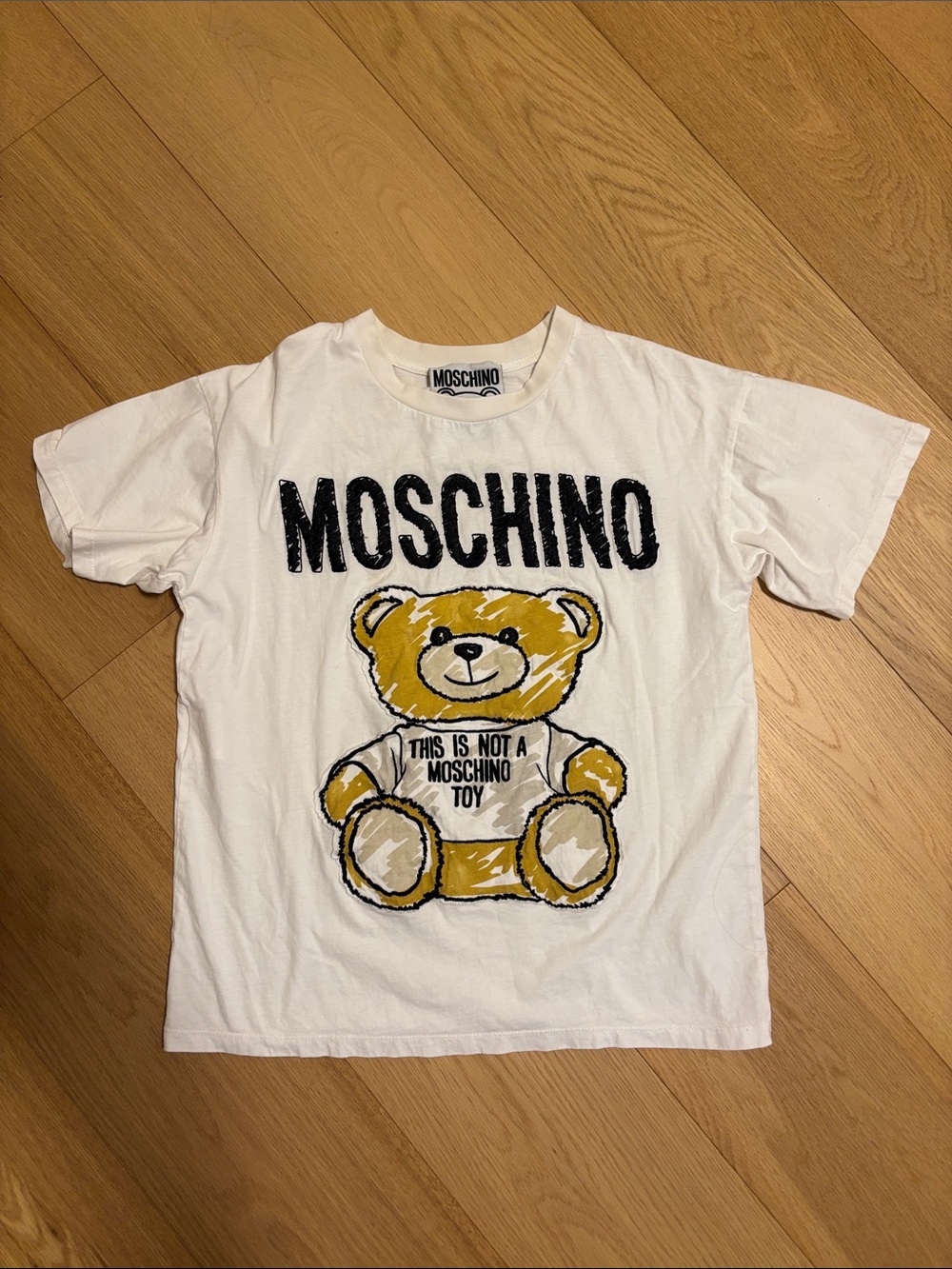 Moschino White Tee with Gold Teddy Bear Graphic